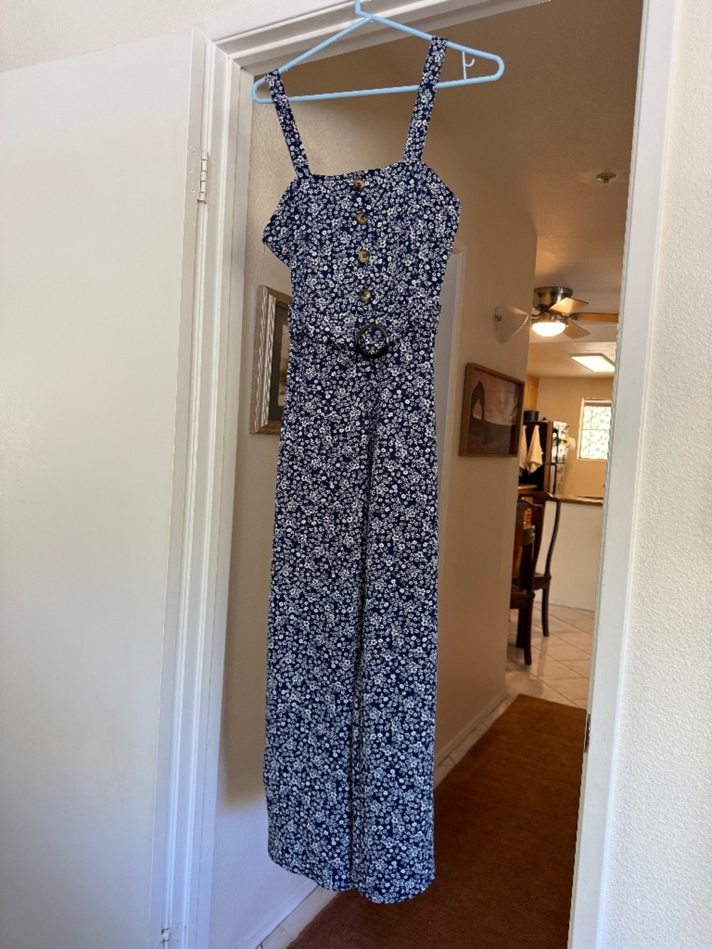 Blue and white 70s style floral jumpsuit